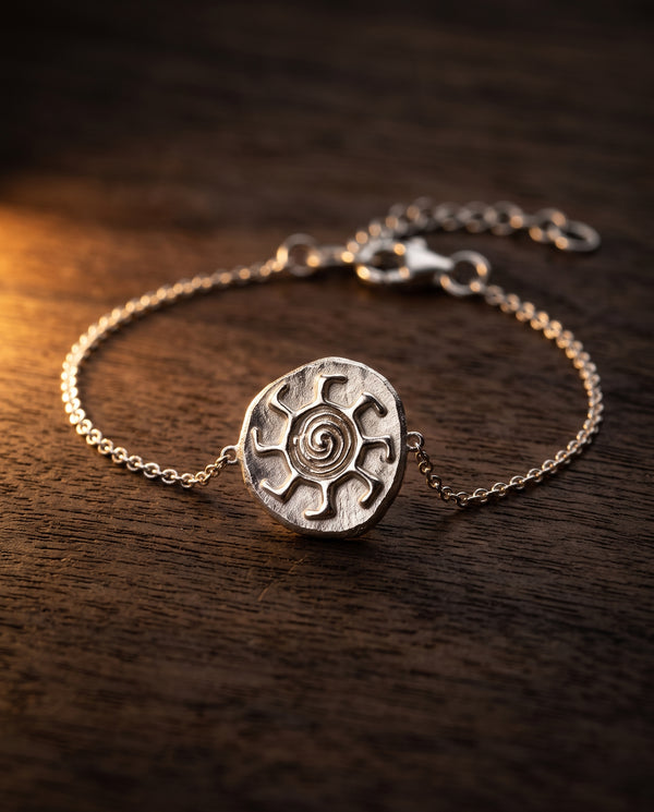 Pulsera plata con sol
