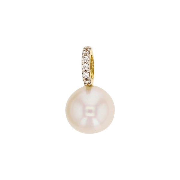 Colgante de oro 18k con perla de agua dulce.