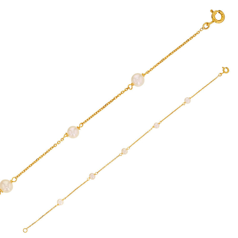 Pulsera de oro ancora con perlas enjauladas