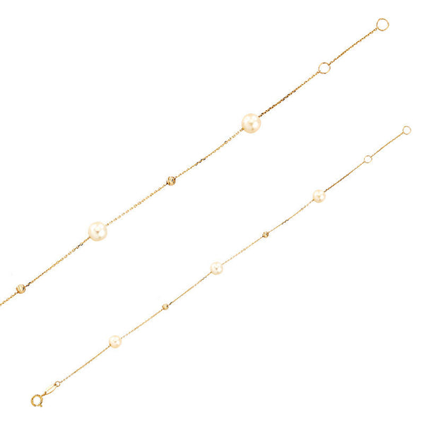 Pulsera de oro con bolitas diamantadas y perlas